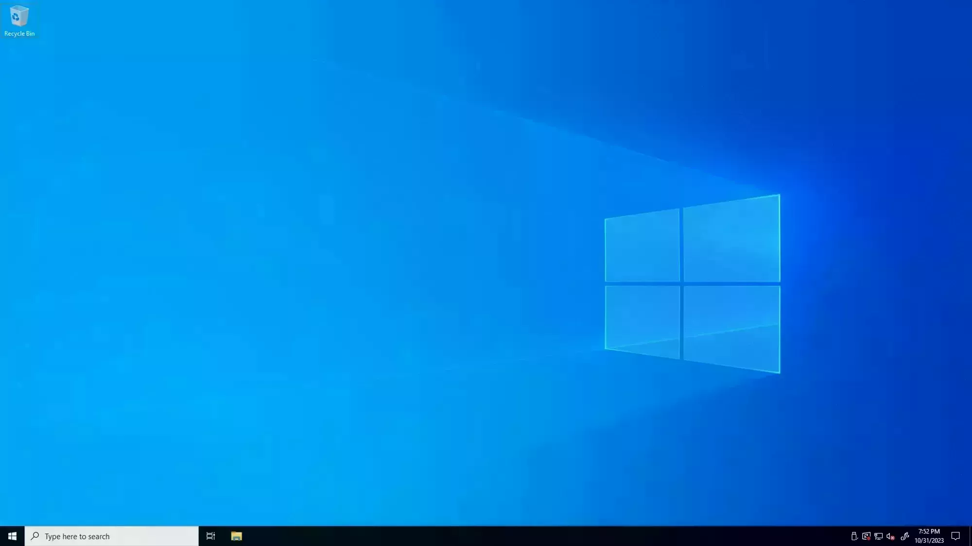 The default Windows 10 background and the Windows 0 taskbar with the search bar enabled.